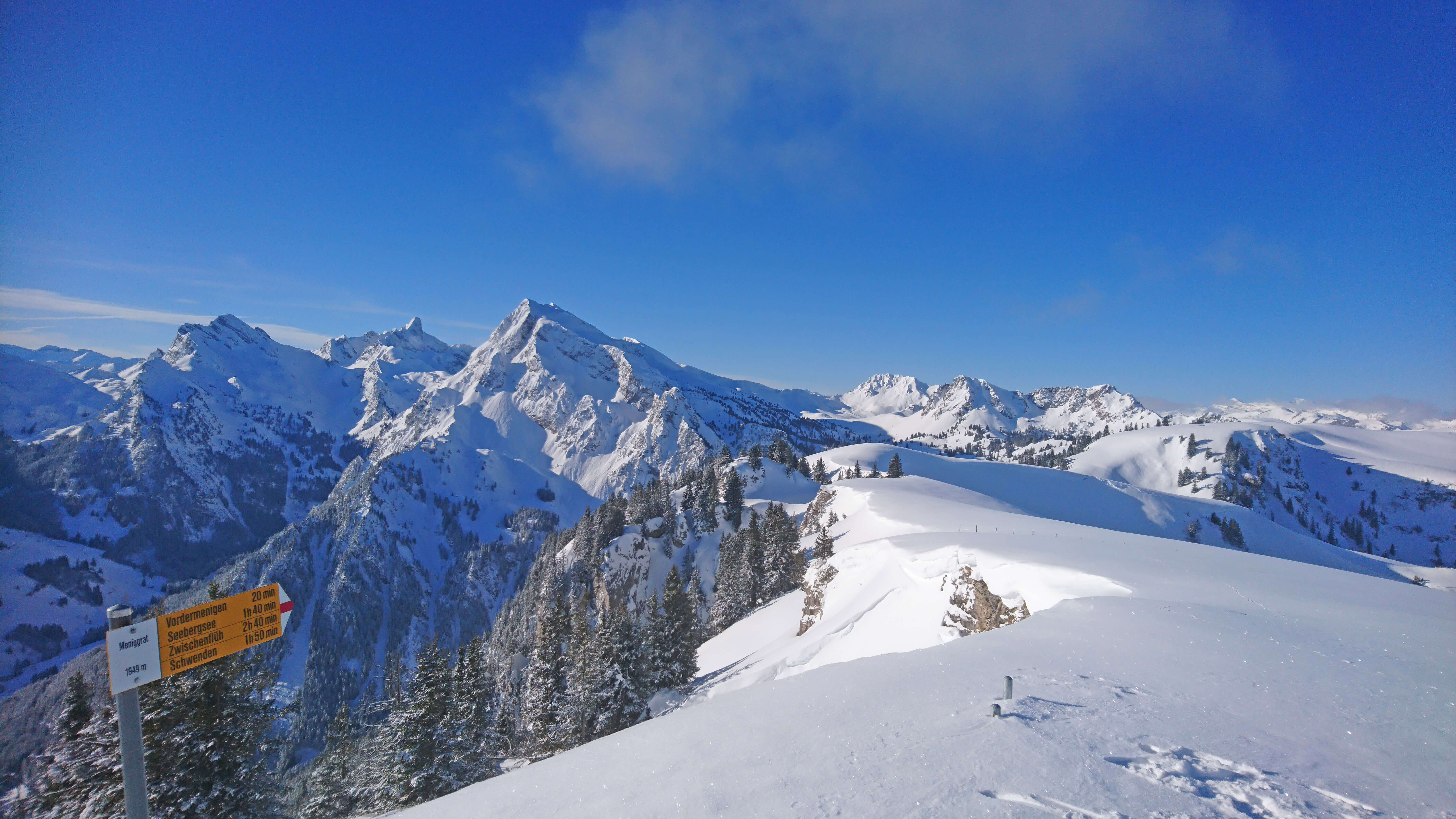 Unforgettable ski tour in snowy winter landscape on the Meniggrat