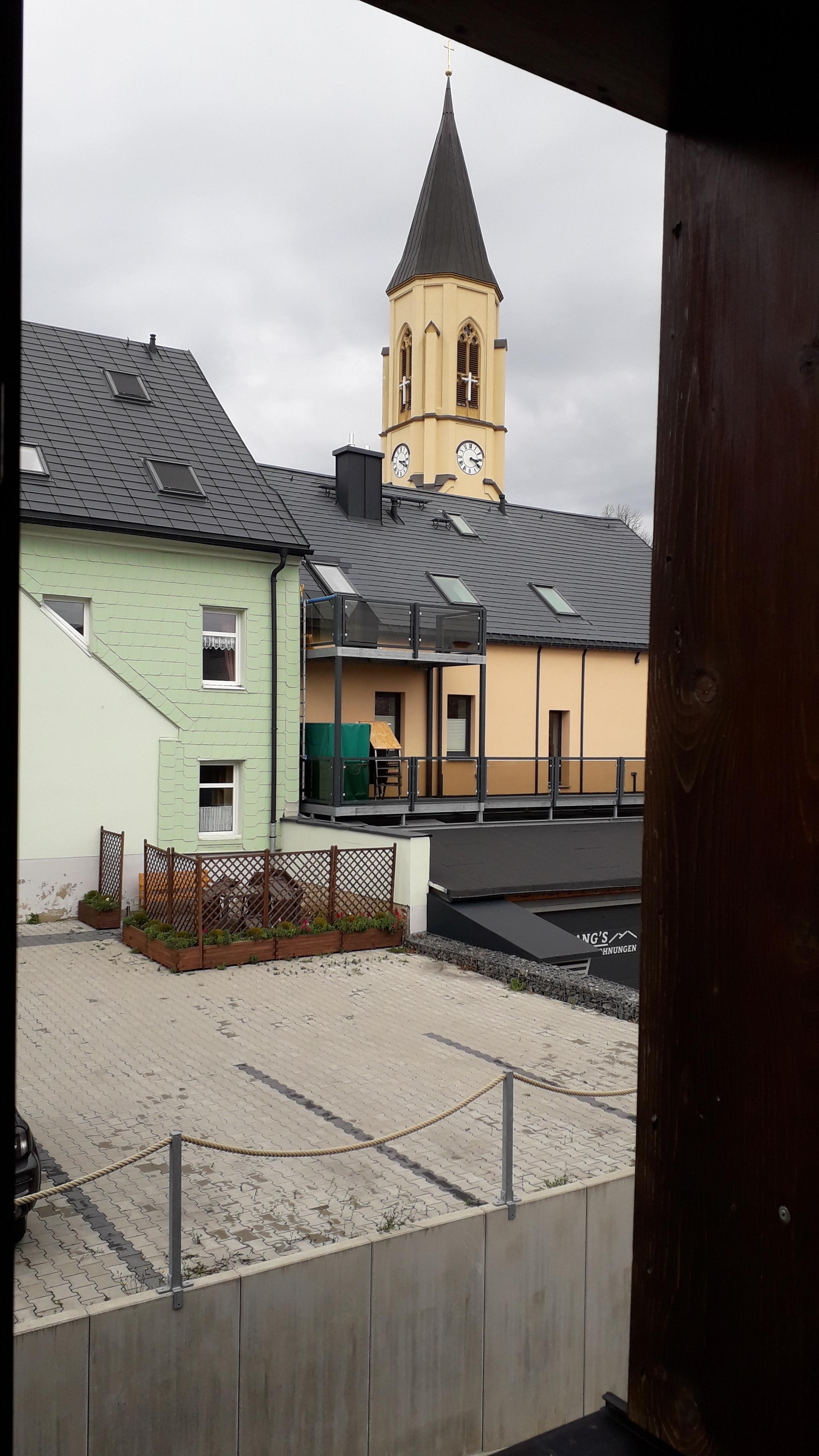 Ferienzimmer „Kirchturmblick“ – Motiv