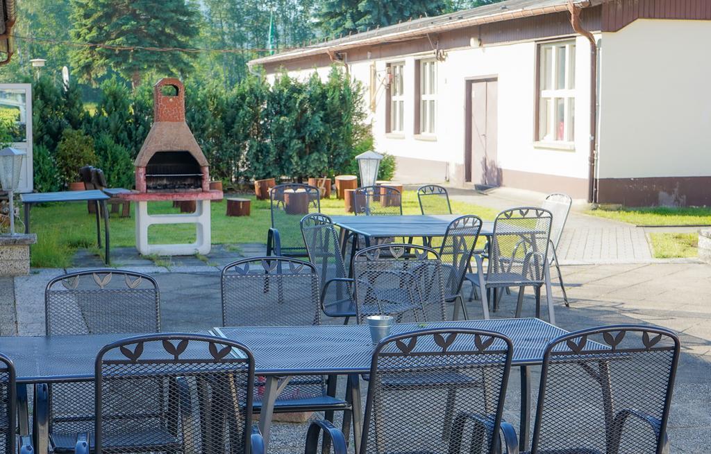 Terrasse mit Grillplatz und Feuerstelle