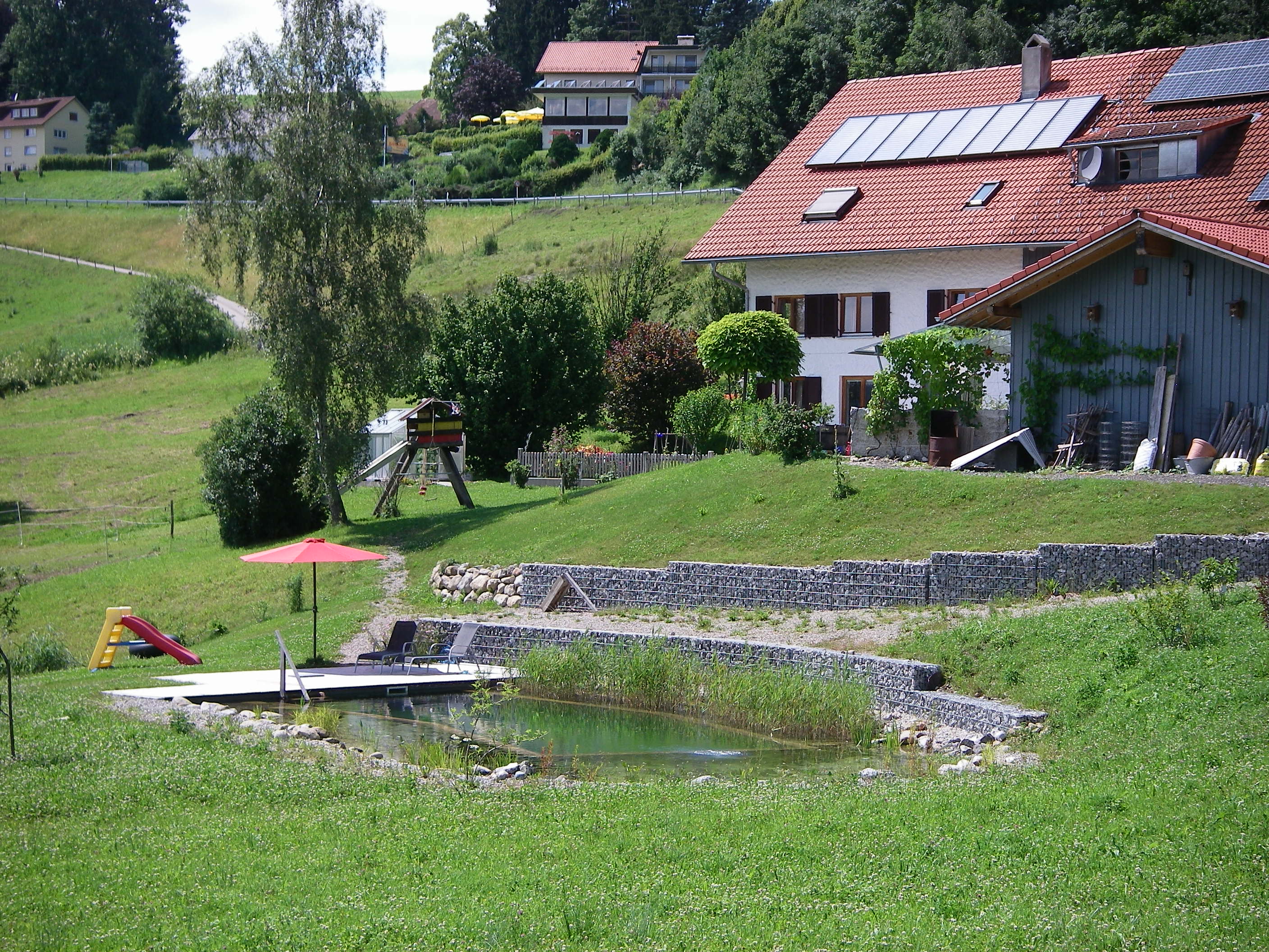 Ferienhof Böller, Garten mit Schwimmteich