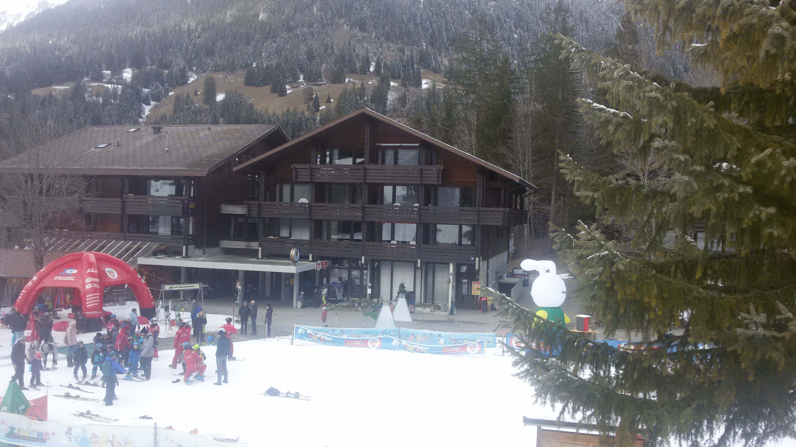 Holiday centre with restaurant and ski school in winter