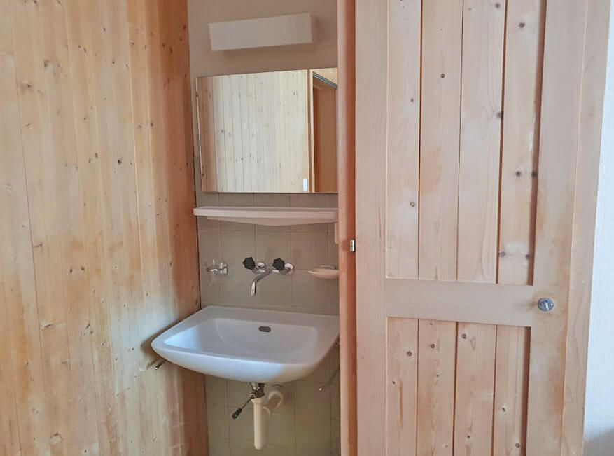 Lavabo with cabinet and mirror