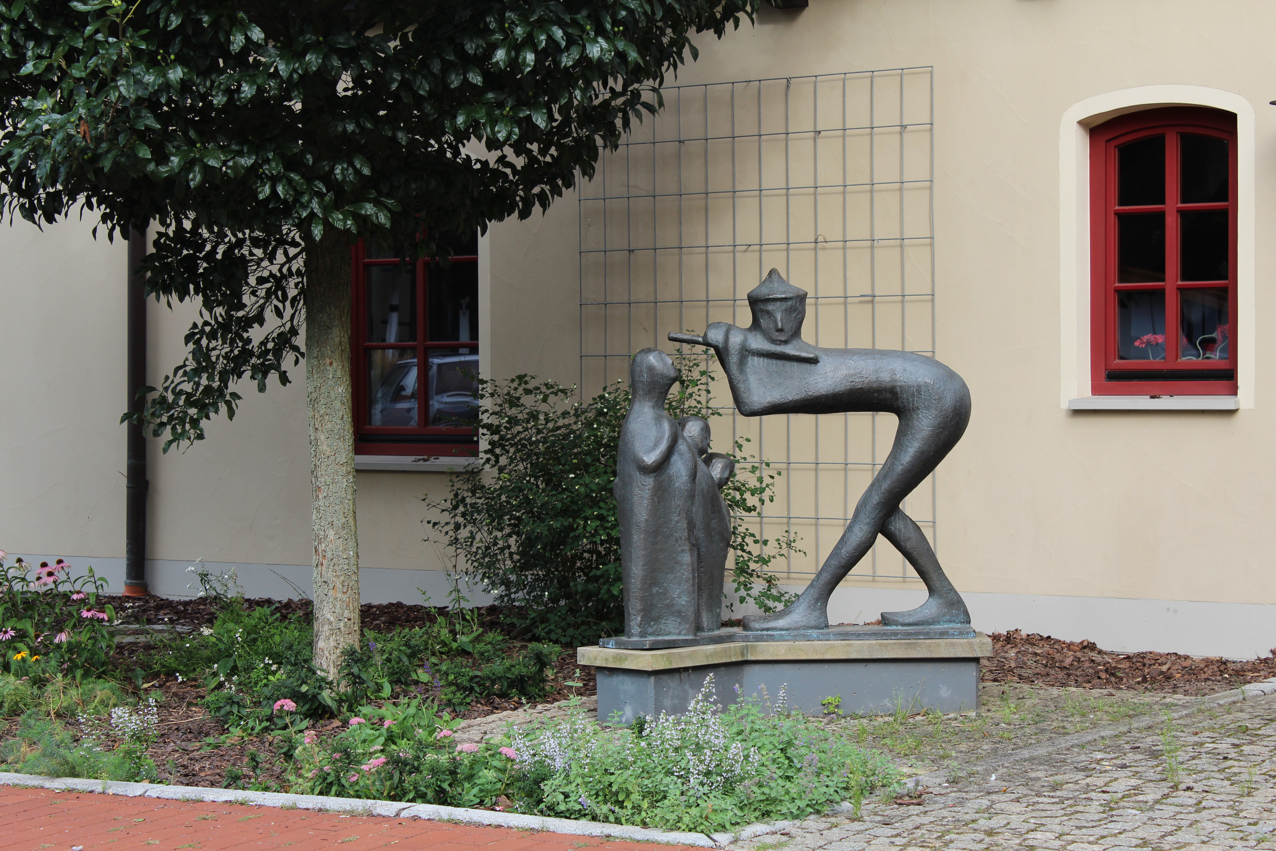 Skulptur "Der Spielmann"